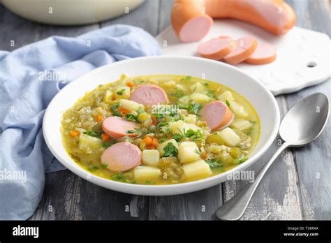 Dutch Split Pea Soup Erwtensoep On A Rustic Table Stock Photo Alamy