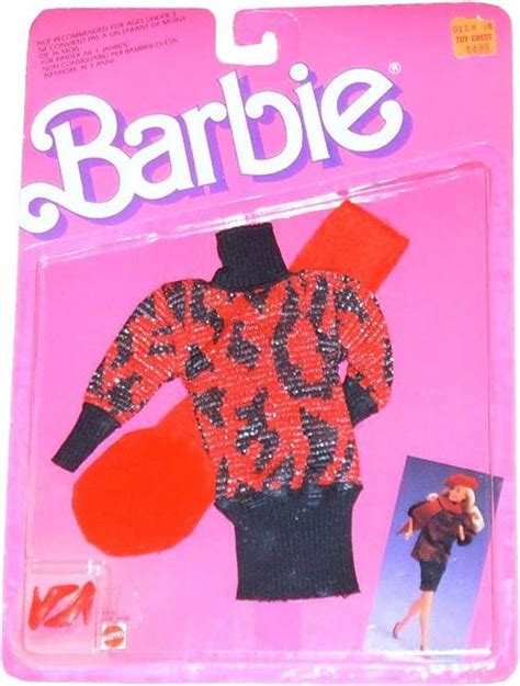 The Barbie Doll Is Wearing An Orange And Black Sweater With Sequins On It