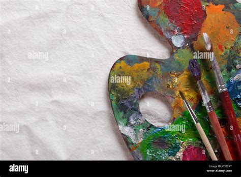 Old Used Artist Palette With Brushes Stock Photo Alamy