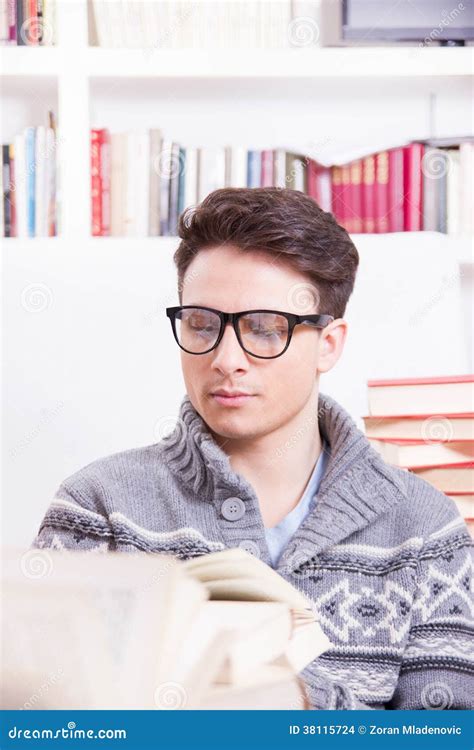 Handsome Young Man Studying And Reading Books Stock Photo Image Of