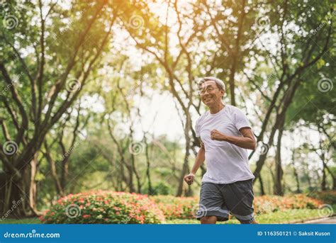 Asian Senior Mature Man Running Jogging In Park Stock Image Image Of
