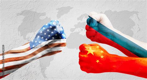 Flags Of Usa Or United States Of America Russia And China On Hands