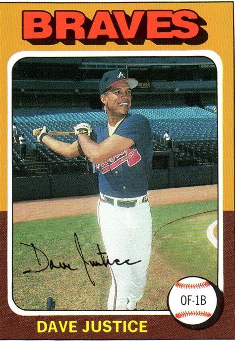 a baseball card with a man holding a bat