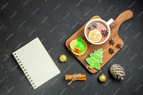 Free Photo Overhead View Of A Cup Of Black Tea Xsmas Accessories