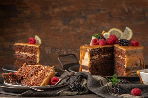 Delicious Semi Naked Chocolate Cake With Caramel Topping And Decorated With Blackberries And