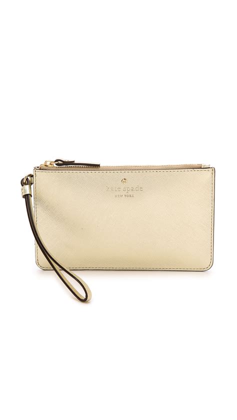 Kate Spade New York Cedar Street Slim Bee Wristlet Gold In Metallic Lyst