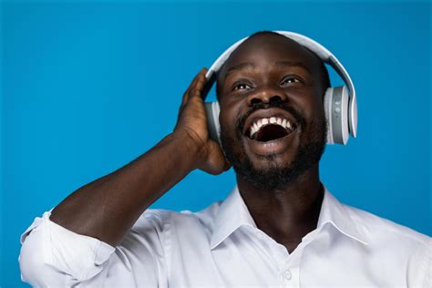 Black Man Listening To Music Stock Photo At Vecteezy