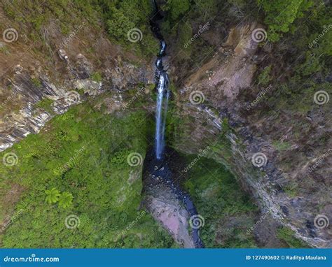 Coban Rondo Waterfall stock photo. Image of panorama - 127490602