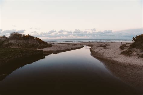 Free Images Beach Landscape Sea Coast Nature Sand Ocean Horizon Marsh Cloud Sunrise