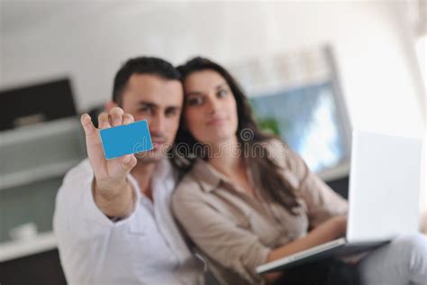 Couple Work On Laptop Computer At Modern Home Stock Image Image Of