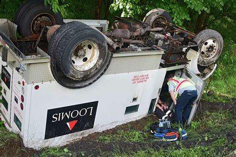 Loomis Truck Rolls Over On Northway