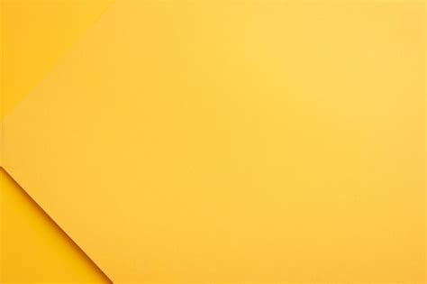 Premium Photo | Surface of yellow paper for background