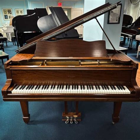 Used Heintzman Grand Piano in Satin Walnut Merriam Pianos