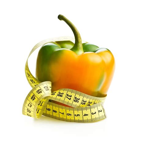 Premium Photo Multicolored Bell Pepper With Measuring Tape Isolated On White Background