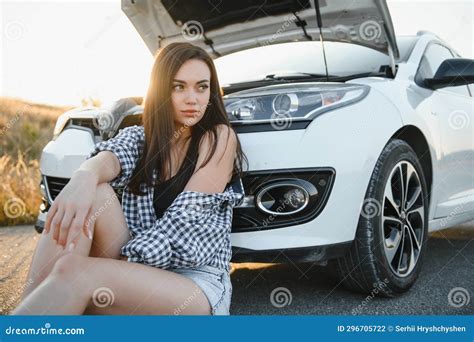 Beautiful Woman Near A Broken Car Confused Woman Does Not Know What To