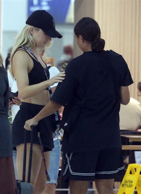 Sam Kerr says goodbye to girlfriend Kristie Mewis at Perth Airport as ...