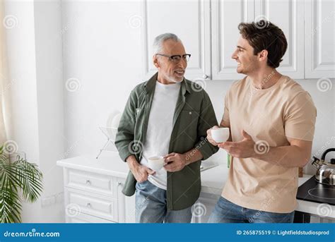 Smiling Mature Man Holding Coffee Cup Stock Image Image Of Caucasian