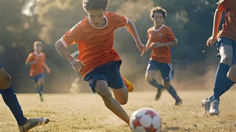 Premium Photo Soccer Player Dribbling Past Defenders Junior Football