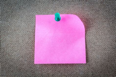 Premium Photo Close Up Of Pink Paper With Thumbtack On Burlap
