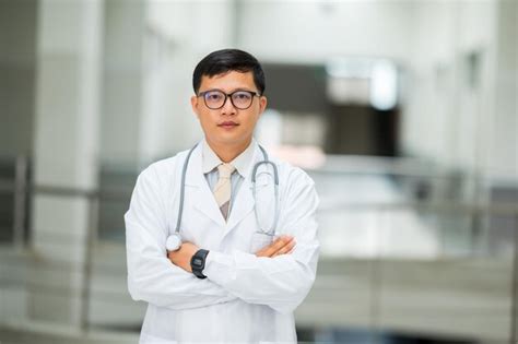 Premium Photo Portrait Of Mature Man Standing Against Wall