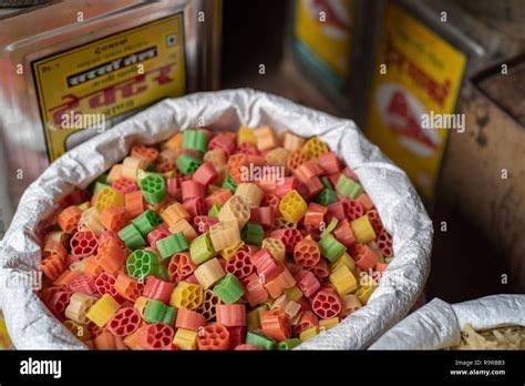 Sacks Of Dry Indian Snack Food Far Far And Cans Of Cooking Oil For Sale