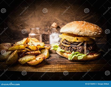 Delicious Homemade Burger With Meat Onions Lettuce And Pineapple