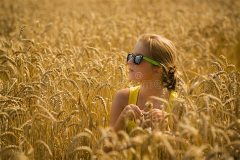 Blonde With Big Breasts Ironing Spikelets In A Field With Wheat Stock Photo Image Of Delight