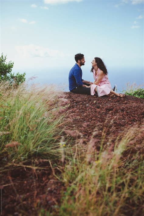 Loving Couple Outside With Ocean Views By Stocksy Contributor Rob