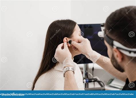 Otoscopy Of Ears With Ear Funnel Ent Doctor With Otoscope Consultation With Otolaryngologist