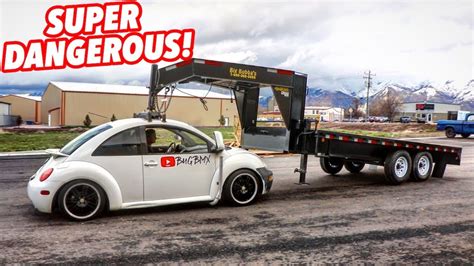 Watch A Vw Beetle Tdi Pull A Gooseneck Trailer With Its Roof