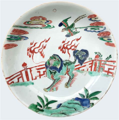 A Chinese Famille Verte Dish Decorated With A Qilin And A Fenghuang