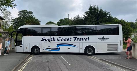 Coach gets stuck in road closed off in controversial LTN scheme ...