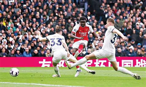 New Age Arsenal Survive Spurs Fightback To Boost Title Charge