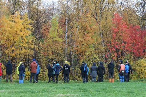 School Pupils And Their Teachers On A Field Trip Learning About The