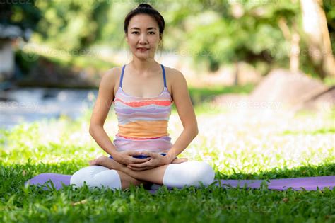 Woman doing yoga exercises. 13484084 Stock Photo at Vecteezy