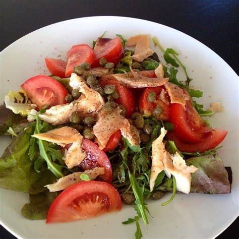 Arugula, lettuce, tomatoes, smoked trout, capers, capers, EVOO, balsamic vinegar, salt & pepper ...