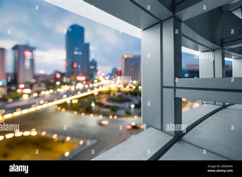 A Birds Eye View Of The City Night View Outside The Window Stock Photo