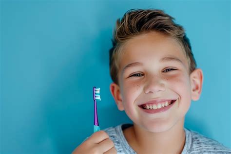 Premium Photo Caucasian Girl With Toothbrush In Her Hand On Light Blue Background