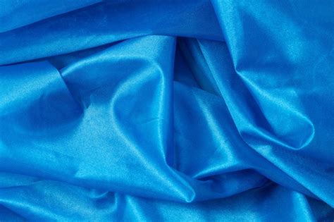 Premium Photo | Blue silk fabric background