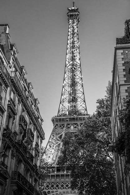 Premium Photo A Vertical Low Angle Grayscale Shot Of The Eiffel Tower