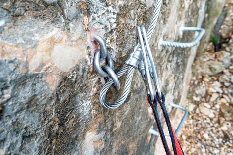 Climbing Carabiner on a Steel Rope Stock Photo - Image of climbing ...