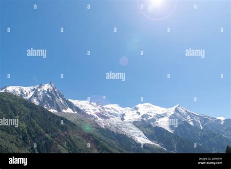 Backlight View With Lens Flares Of The Summit Of Mont Blanc 4808 M