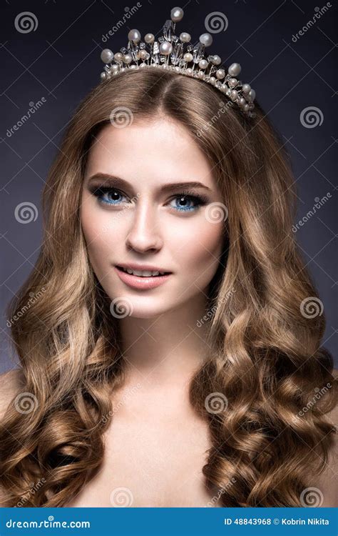 Beautiful Girl With A Crown In The Form Of A Princess Stock Photo