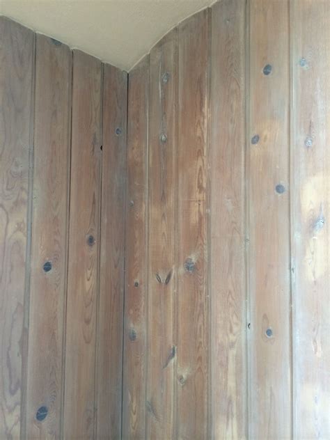 White pickling of knotty pine paneling | Knotty pine paneling, Knotty pine walls, White paneling