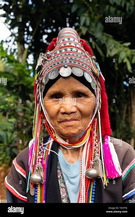 Akha Woman With Silver Jewellery And Headdress Portrait Hill Tribes