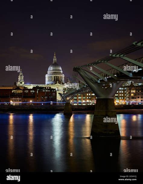 St Paul S Cathedral And Millenium Bridge In London At Night In