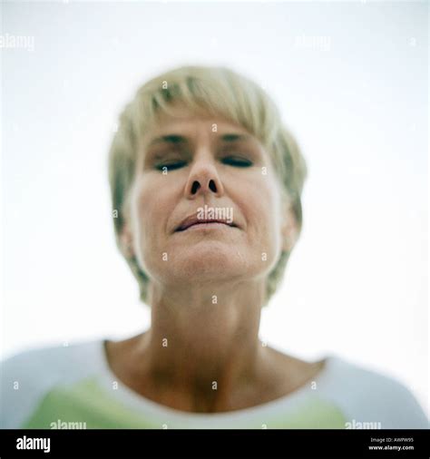 Portrait Of Mature Woman Eyes Shut Stock Photo Alamy