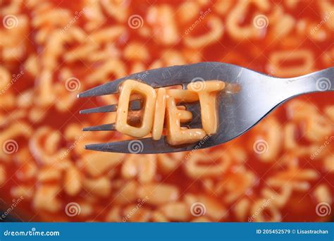 Spaghetti Letter Spelling The Word Diet With The Letters Held Up On A