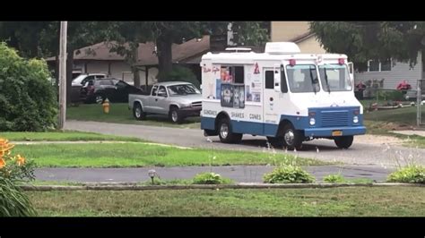 Grumman Olson Mark IV Mister Softee Ice Cream Trucks Passing By And In