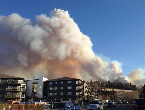 Smoke From A Wildfire Fills The Sky In Downtown Fort Mcmurray Looking